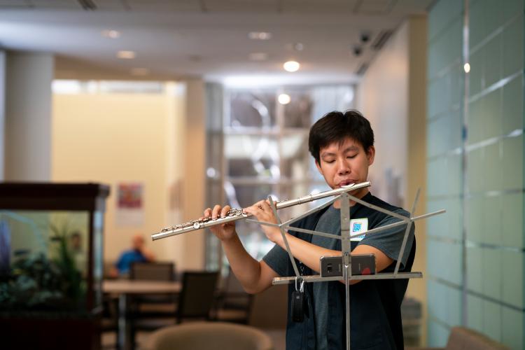 Jo Jo Liu performs at JPS Health Network Oncology and Infusion Center in Fort Worth, Texas.